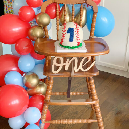 high chair with cake on it