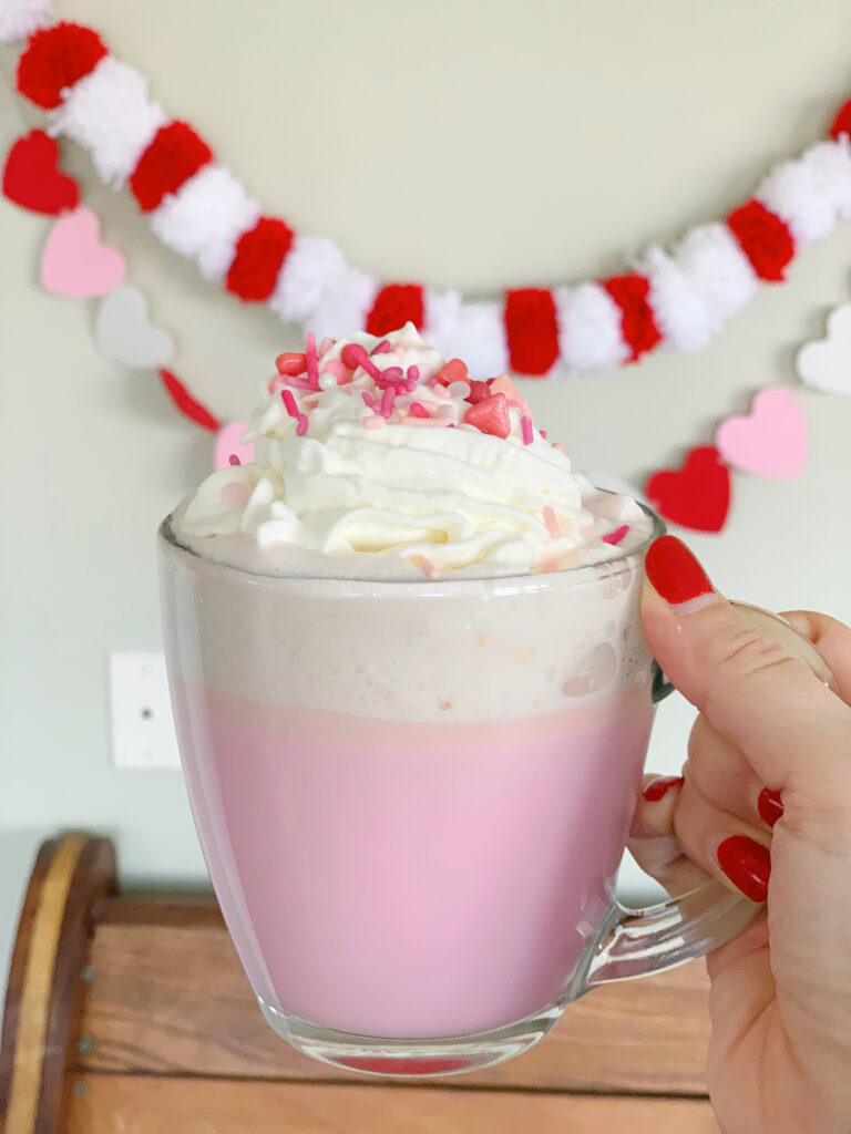 clear mug of pink hot chocolate