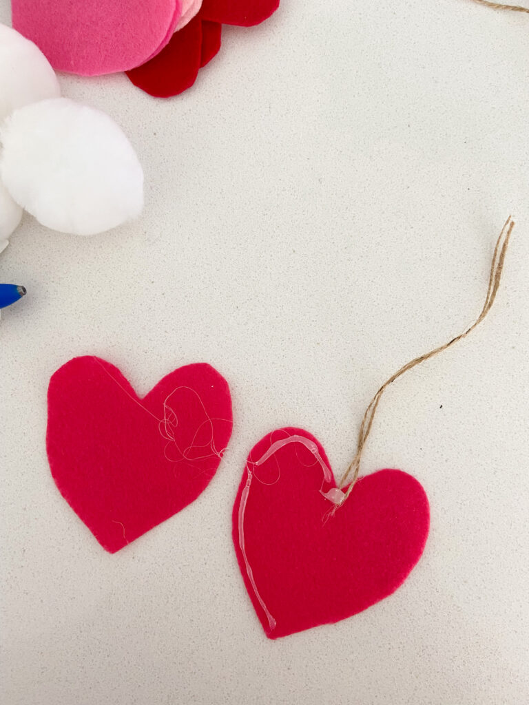 hearts shaped out of felt that have been glued together. 
