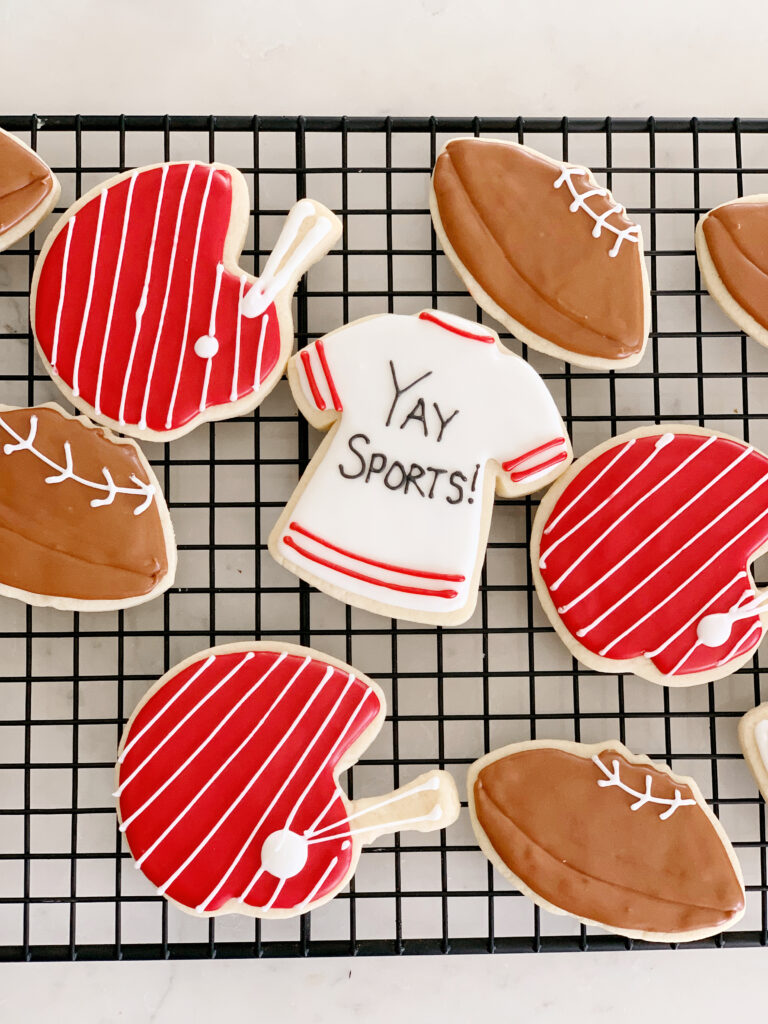 sugar cookies on tray with royal icing