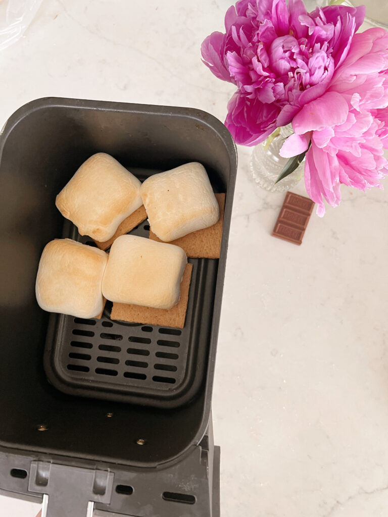 s'mores in air fryer basket on counter. 