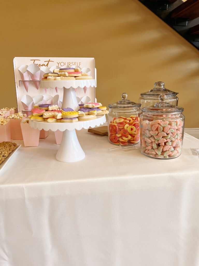 cookie display and candies in glass jars. 