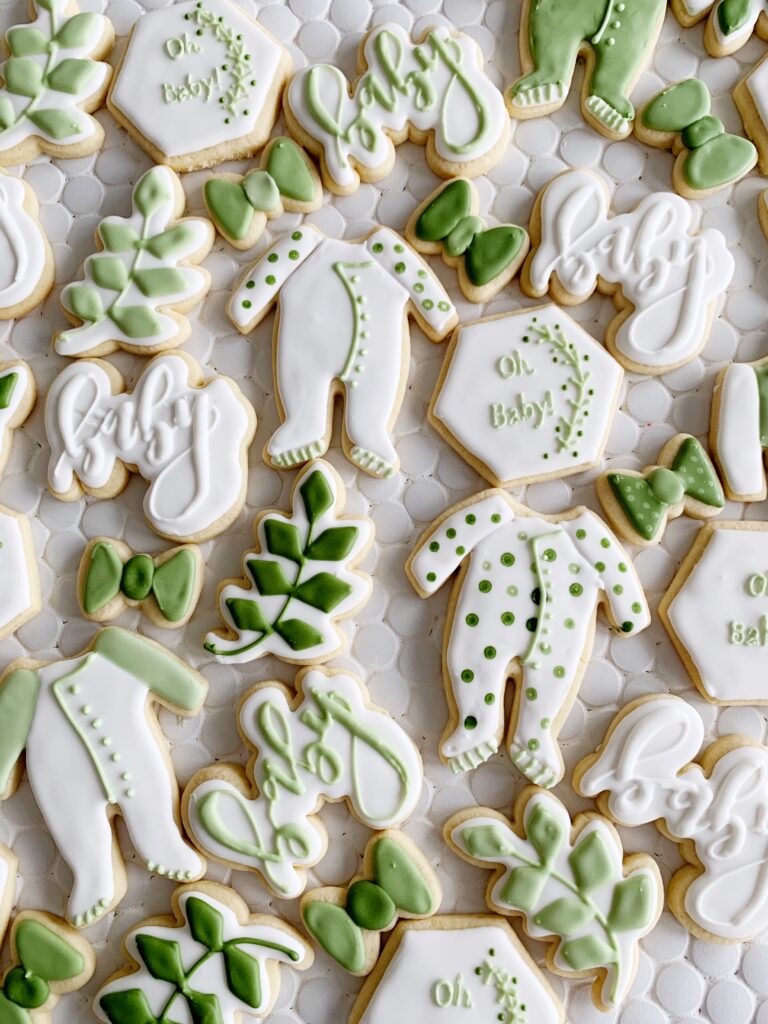 Baby shower cookies in shades of green. 