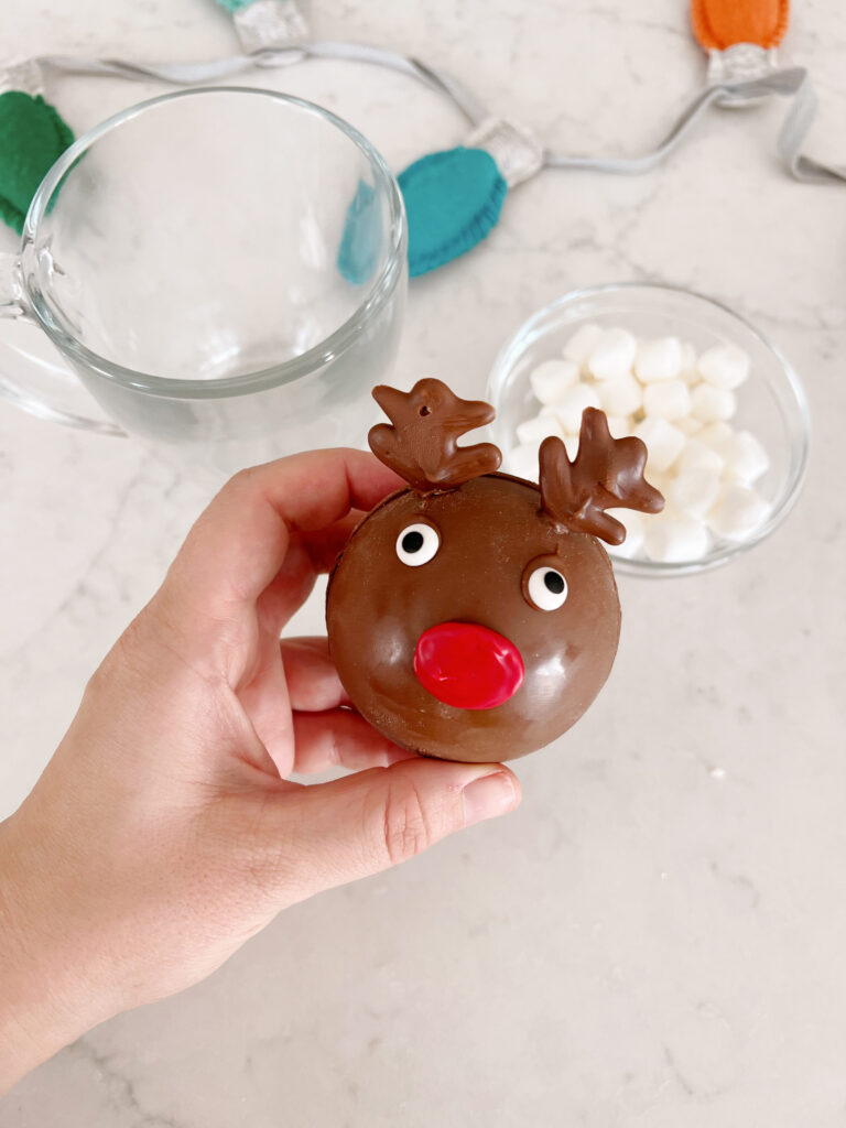 hot chocolate bomb shaped like a reindeer. 