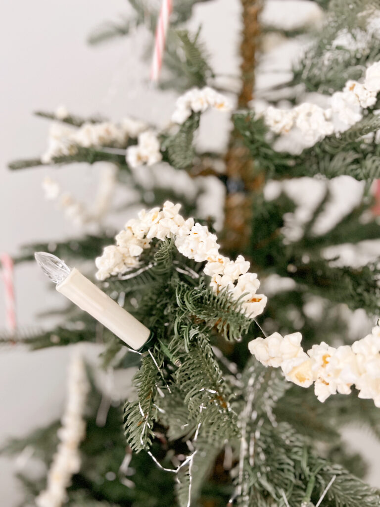 Popcorn garland on Christmas tree. 