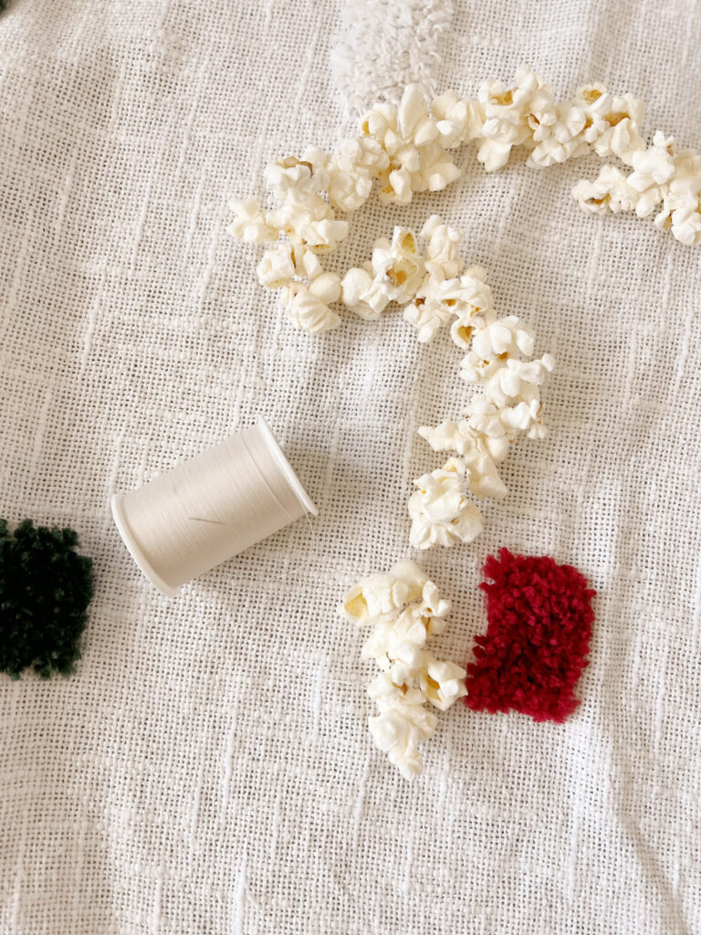 spool of yarn and a popcorn garland