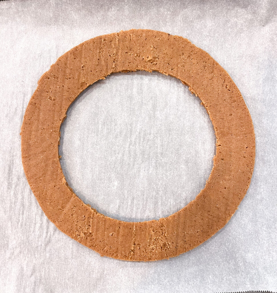 gingerbread cookie dough circle cutout. 