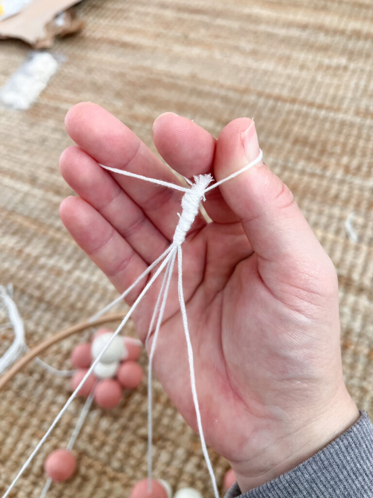 Hand knotting string. 