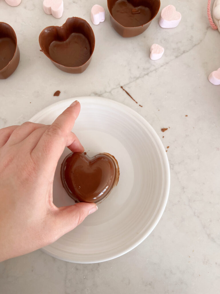 melting edges of heart-shaped chocolate shell. 