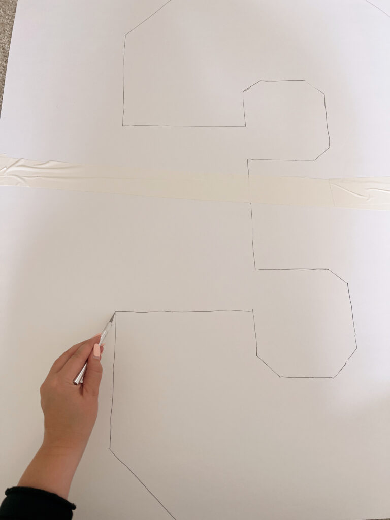 cutting out foam board that had been taped together. 
