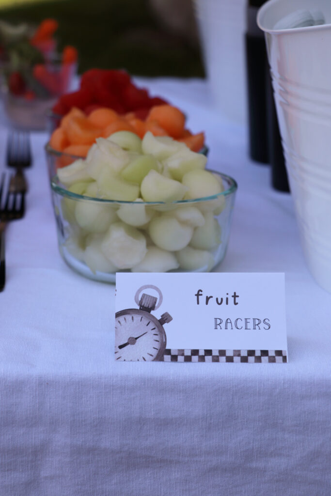 melon balls in bowls as fruit racers. 
