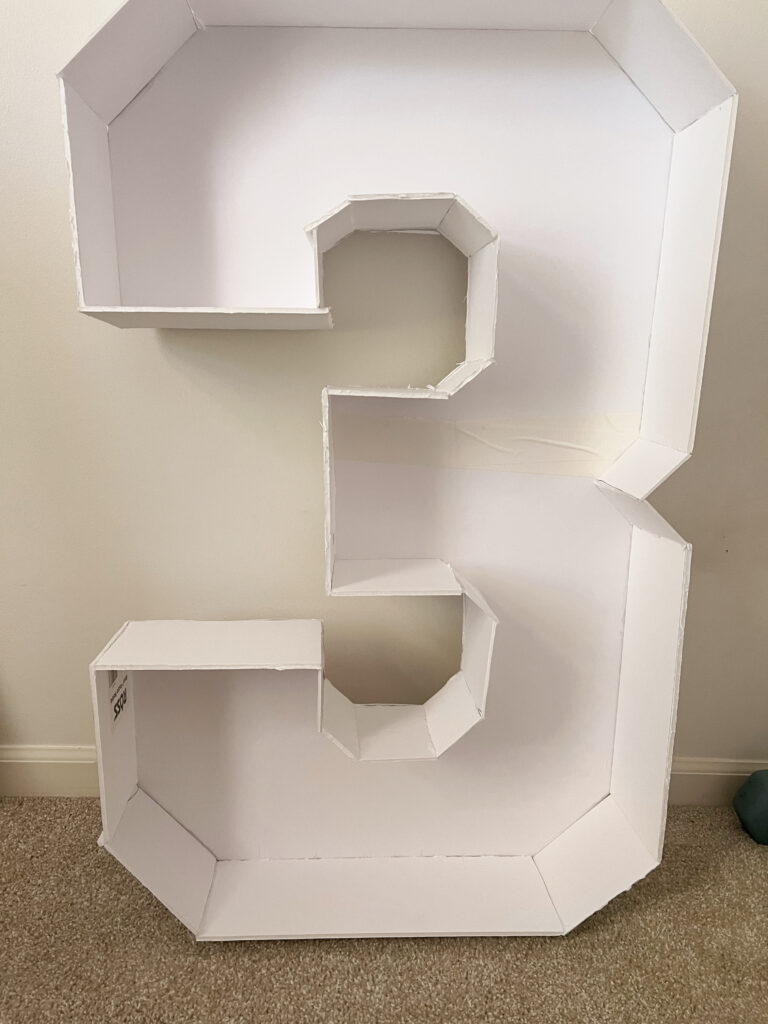 Number 3 marquee made from foam board. 
