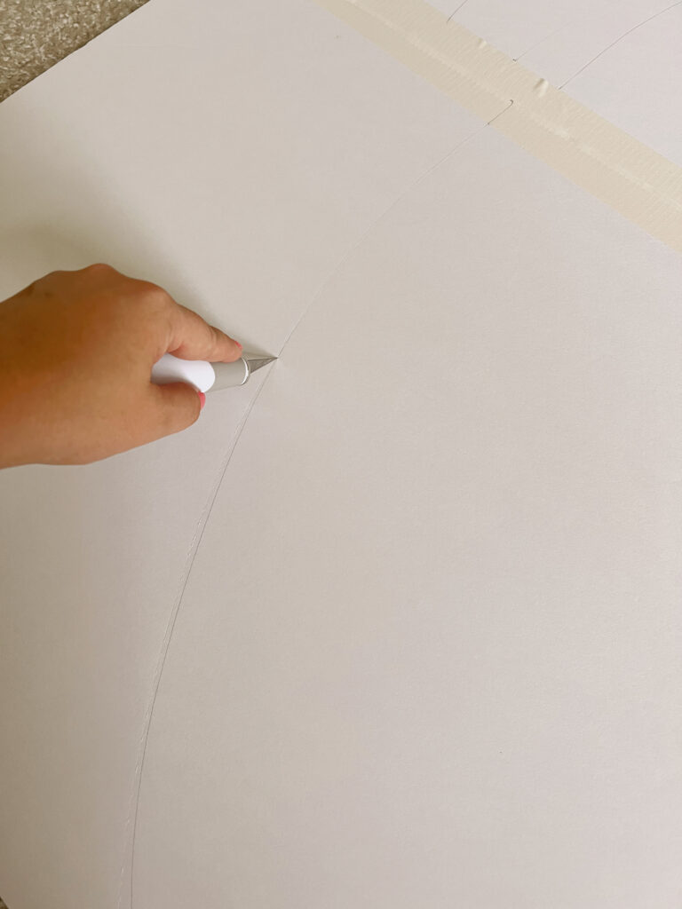 Scoring of foam board to create a curved shape. 