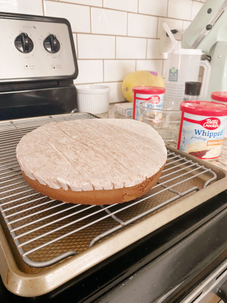 Cake being layered. 