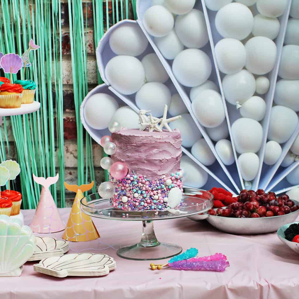 Mermaid themed birthday cake and birthday party.